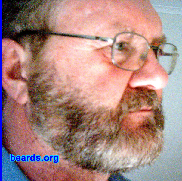 Norm
Bearded since: 1968.  I am a dedicated, permanent beard grower.

Comments:
I grew my beard because my brother had a beard and I wanted one, too. This one is growing from a goatee into a full beard.

How do I feel about my beard?  I would feel naked without one. I felt that my goatee was aging me a bit so I have resorted to a little help in the coloring department. I am delighted with the results, which I believe make me look years younger. Now if only I could grow something on top of the head...
Keywords: full_beard