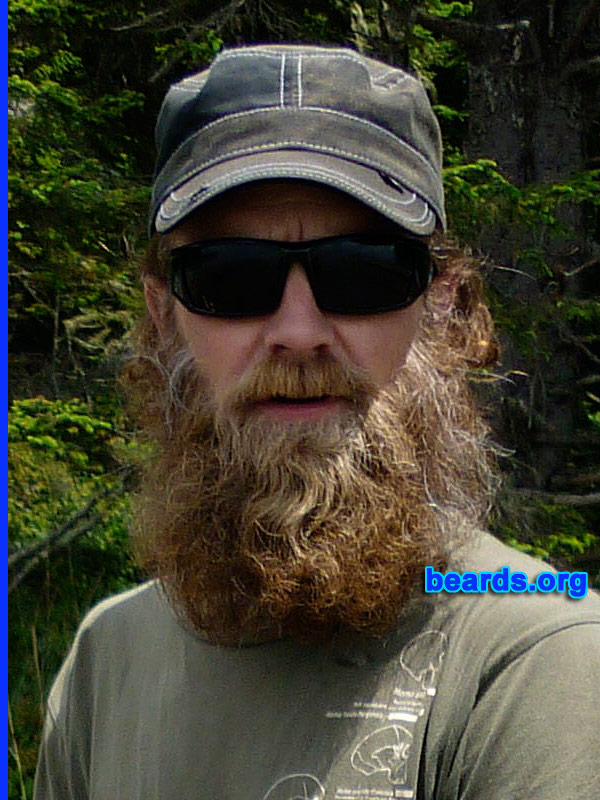 Eric
Bearded since: 1999.  I am a dedicated, permanent beard grower.

Comments:
Why did I grow my beard? 
It was time.  

I always kept it neat and no more than an inch and bit and then came the concussion in September 2011. I couldn't handle noise for a while so trimming was out of the question.  I have never looked back.  It is currently about seven-to-eight inches.

How do I feel about my beard? Love it. Don't leave home without it!
Keywords: full_beard