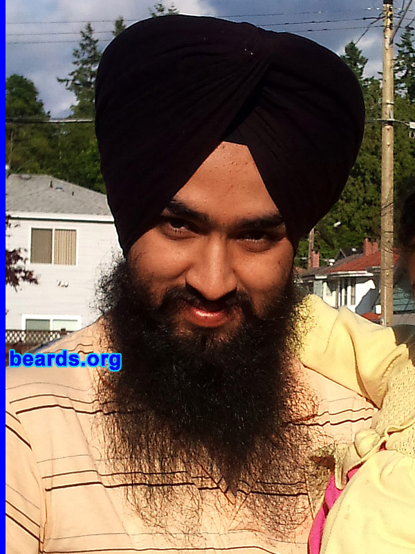 Gurmandeep S.
Bearded since: 2004. I am a dedicated, permanent beard grower.

Comments:
I grew my beard because I am a Sikh. It is a norm in Sikhism not to trim or shave facial hair. So, I haven't trimmed my beard ever and like to keep it free flowing.

How do I feel about my beard? I love it. I feel strong-willed and unique. I just love my beard!!
Keywords: full_beard