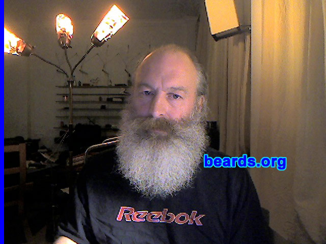 Andrew K.
Bearded since: 1995.  I am a dedicated, permanent beard grower.

Comments:
At first I grew my beard because I was tired of the permanent shaving rash (thick hair /soft skin).  So I kept it short with a trimmer, but this year I've grown it longer at the suggestion of my two young daughters (part of their long-term plan to keep me single I believe).  They love it and have hidden all the scissors!

How do I feel about my beard?  I like it.  It feels very natural, but then again, I haven't got to look at it. Beards aren't very popular in this part of Germany.  So I have to put up with such original comments like "you look just like Father Christmas" all day.  But I do seem to be treated with a lot more respect now.
Keywords: full_beard