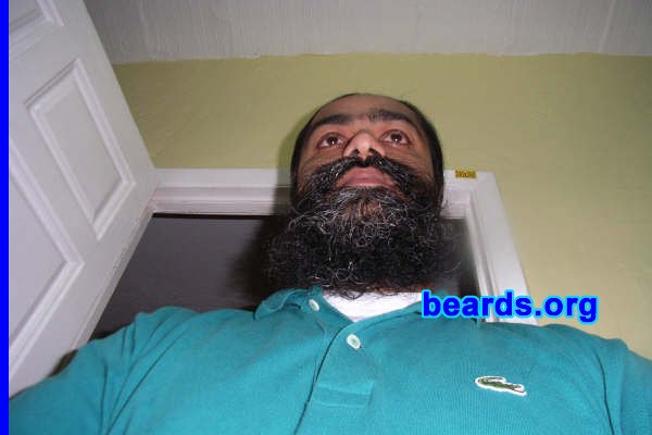 Malinder Singh
Bearded since: ... all my life.  ...never shaved.  I am a dedicated, permanent beard grower.

Comments:
I grew my beard, in principle, because of my religion. With the passage of time, understood that it is mark of a man.  Somehow, a man without a beard just does not say anything to me. Feel as if somewhere some part of his personality is missing...only my opinion.

How do I feel about my beard?  Great.  It's not very long, but it's natural and that's what makes me feel good.  It's all about nature...isn't it?
Keywords: full_beard