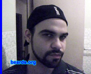Gualbert
Bearded since: 2010.  I am an experimental beard grower.

Comments:
I grew a beard because I have had an interest in it for years. I have tried goatees, chin strips, and several experiments, but I had never tried the beard until recently. Although I'm a young guy, I'm a serious and reserved individual, so it also suits my personality.

How do I feel about my beard? I definitely like it but, being my first attempt, there is a lot of room for improvement. I'm considering shaving it off to regrow it in a different shape with a higher cheek line. Still, it's quite an experience and it alters your look considerably.
Keywords: full_beard