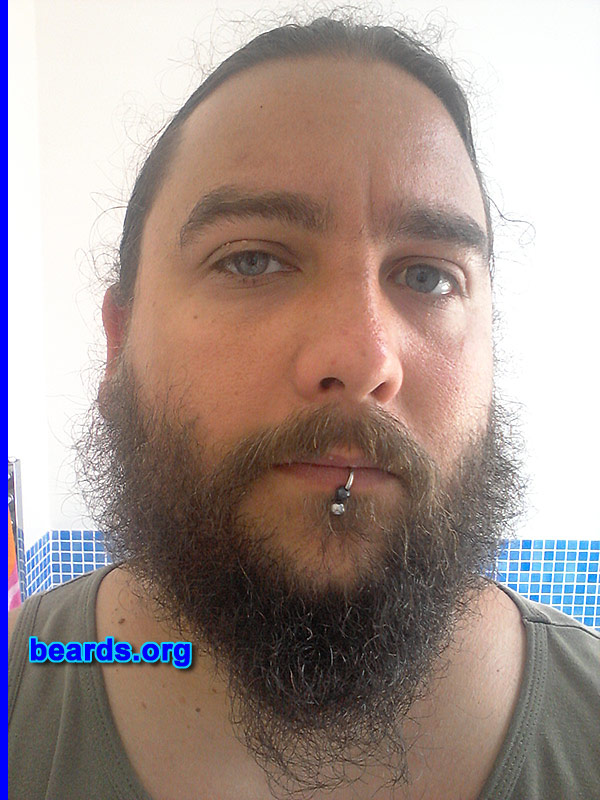 Dave S.
Bearded since: 2008. I am a dedicated, permanent beard grower.

Comments:
Why did I grow my beard? I originally started growing my beard to match my more metal and rock image.  But it has become much more than that now. I have tried many styles and I'm now going for a full beard. I couldn't ever imagine myself without a beard!

How do I feel about my beard? I like the length from my chin, but I'm having issues with the sides growing out and curly.  I'm hoping in a few months it will weigh down and look a little less "wild homeless man" and more full "god like" beard.
Keywords: full_beard