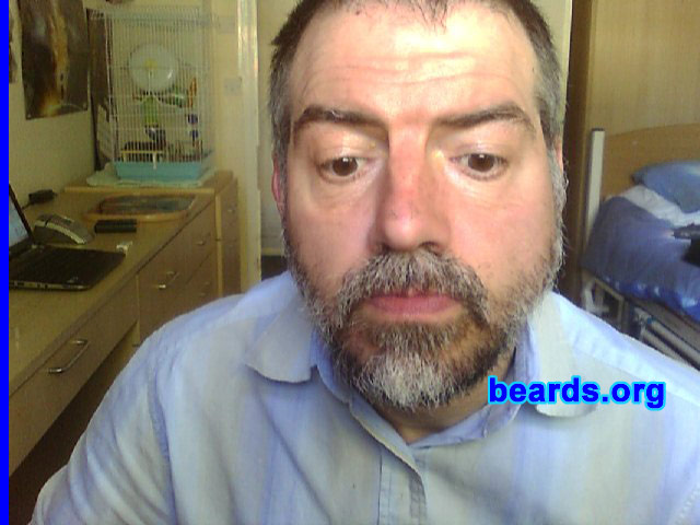 Lee Driver
Bearded since: 1990. am a dedicated, permanent beard grower.

Comments:
I grew my beard because I cannot shave. I have had a beard for over thirty years now and I wouldn't shave it off.

How do I feel about my beard? It feels great. I love having a beard. I like the feel of hair growing on my face. 
Keywords: full_beard
