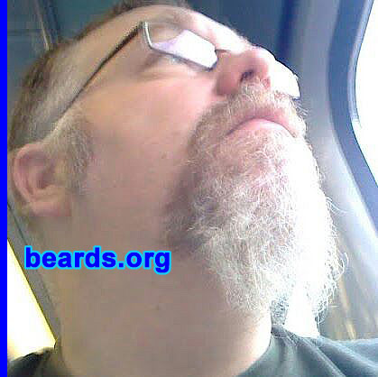 Mike M.
Bearded since: 2001. I am a dedicated, permanent beard grower.

Comments:
I grew my beard because I was fed up of shaving, although I do occasionally trim the cheeks when heading out on the beer. ;-)

How do I feel about my beard? It's there and I like it. ;-)
Keywords: goatee_mustache