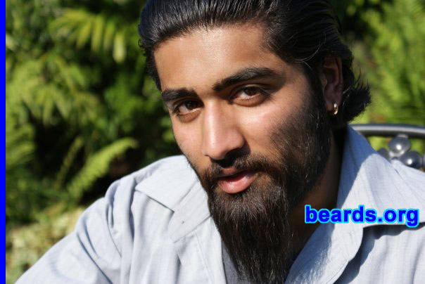 Ravi
I am an occasional or seasonal beard grower.

Comments:
Why did I grow my beard? Something different. I cut my long hair short.  Therefore I felt I needed to make up for it somehow. Once my hair was long enough, I shaved my beard.

How do I feel about my beard? It grows fully. I like the fact that I can have any style I want.
Keywords: full_beard