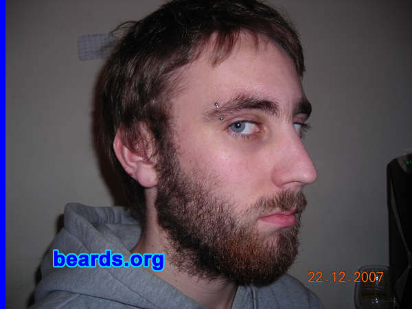 Steven
Bearded since: 2005.  I am a dedicated, permanent beard grower.

Comments:
I was too lazy to shave it off, and so I just kept growing it.

How do I feel about my beard?  I often bite the hairs of my beard by pushing it to the side of my mouth, which is a bad habit. My beard puts a lot of age onto my face, but during winter time it can keep my face very warm. My family often say, "Steven, get a shave.  You look like you sell the big issue!".  I'm proud of my rough look.  I hope you like it, too.
Keywords: full_beard
