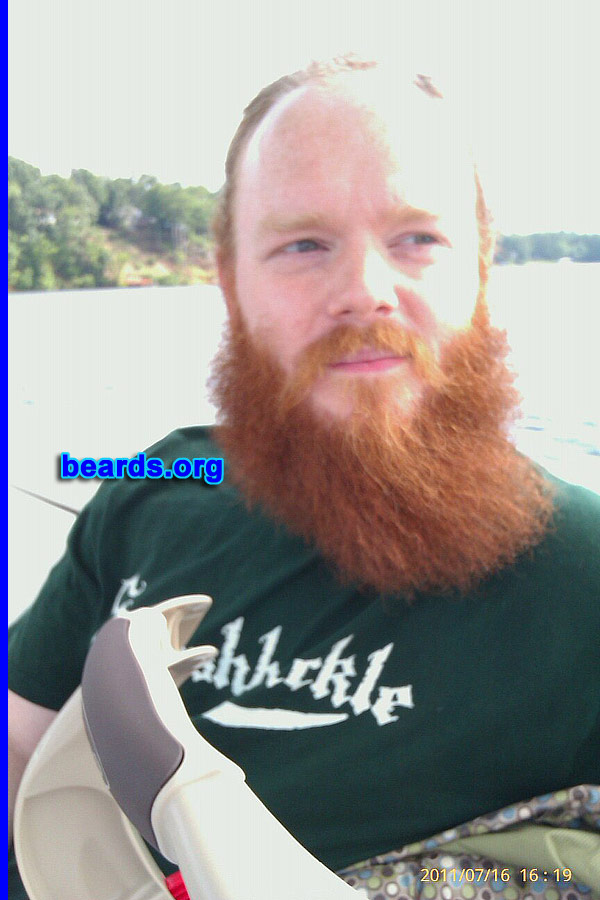 Ronnie C.
Bearded since: 2000. I am an experimental beard grower.

Comments:
I've always wanted to grow facial hair since I was a child. My maternal grandfather had a long beard with a curly mustache and I personally believe that he gave me not only inspiration but also genetic desire by blood.

How do I feel about my beard? I love it! It's taken a long time to fill in and possibly could still be in the process, but I love it the way it is. It's dark auburn red with a blonde-ish mustache. Very thick. Just around the mouth is where the smoother/thinner section is, as it is for many men.
Keywords: full_beard