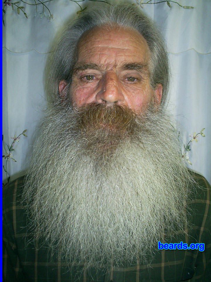 Mike B.
I am a dedicated, permanent beard grower.

Comments:
Why did I grow my beard? My wife says if I shave I'm sleeping with the donkeys.

How do I feel about my beard? Warm in the winter, cool in the summer. The girls like it.
Keywords: full_beard