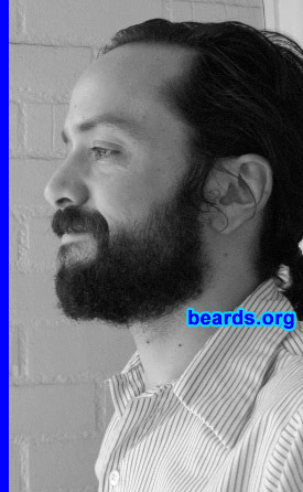 Ian
Bearded since: 2008.  I am a dedicated, permanent beard grower.

Comments:
I wanted to see what my beard would look like if I just let it grow. Before this beard, I always had a goatee, mustache, or fu-manchu and I just got tired of the trimming. I only shave a one-inch strip at the bottom of my neck now.

How do I feel about my beard?  I think it's pretty cool. It's definitely a work-in-progress. I think I want to grow it until it's long enough to braid it.
Keywords: full_beard