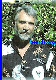 John J.
Bearded since: 1970, off and on.  I am an occasional or seasonal beard grower.

Comments:
I've grown a beard, etc. off and on for different periods of time over the last forty years. It's like a form of dress to me, I think.

How do I feel about my beard?  I liked it okay, but never really kept it up. I just let it grow without realizing when it passed from neat and short to...well, too much. It was much simpler to not shave and I liked that. I would get favorable comments from men and women off and on, so that was nice.

It was a hassle eating ice cream or drinking anything. Biting down on a hamburger or sandwich usually got me a hair stuck in my teeth which was pulling my lip in after the bite I was chewing. I had to keep the mustache cut at the lip.
 
I don't like it anymore because it's gray.
Keywords: full_beard