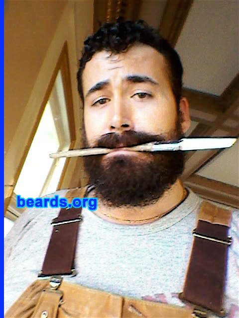 Jason L.
Bearded since: 1999. I am a dedicated, permanent beard grower.

Comments:
I've always been one to experiment with my physical appearance. Once the hair on my face started to grow it was all about fun. Started with a chin strap for a few years, went clean (stubbly) for a year, then grew it full for the long haul here. I shave it down mistakenly every other year or so and quickly realize the error of my ways. It's good to keep the hair fresh though.

How do I feel about my beard? I love it. I just wish I could figure out how to have my 'stache really long and not waxed nor in my food. Although having a messy ice cream beard in the summer can be fun. I just feel naked without it nowadays. Just part of who I am, nothing special.
Keywords: full_beard