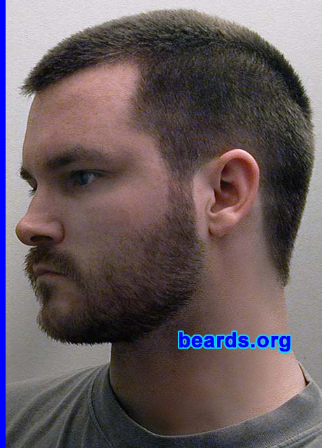 Kenzie LaMar
Bearded since: 1999.  I am a dedicated, permanent beard grower.

Comments:
I grew my beard because  I love them on men and had wanted one for myself for years, but couldn't grow one that looked full enough.  When I turned 21, I finally let it grow fully.  It was almost there.  I shaved it and then regrew it a year later.  Had one ever since.  I do art of bearded men.  I am a trained painter.  I am a pogonophile and love hair growth all over the male body.

How do I feel about my beard?  I like it and get lots of compliments that it looks good on me.  I wish it were more full and had less bald spots.  I would like it to be darker, too.  I am trying to grow it a bit longer now, but the hair is so straight that it just starts to stick out everywhere and looks bad.  Guys that have a bit of a curl seem to be able to let therr beards grow much longer and it looks good.  My beard isn't full enough to grow a really long beard.  It would look really bad.  That's fine, though, because I like shorter beards to medium length.
Keywords: full_beard