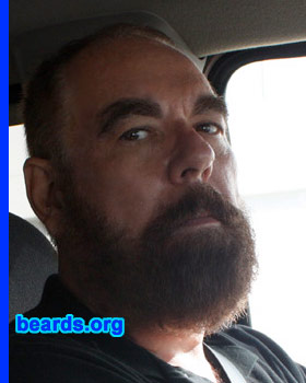 Ron
Bearded since: 1980.  I am a dedicated, permanent beard grower.

Comments:
I had a "foomanchoo" mustache and worked with a group of about thirty guys, with the majority having beards (we were butlers at the Playboy Mansion). A few had blank spots in their beards, but I knew mine would grow in full. So I let the "foomanchoo" grow into a beard. Did cut in down to a goatee in the late 1990s, but finally let it grow back to a full beard.

How do I feel about my beard?  In the beach community were I live, I don't see many guys with beards. Sure wouldn't want to be shaving daily or twice a day if going out.
Keywords: full_beard