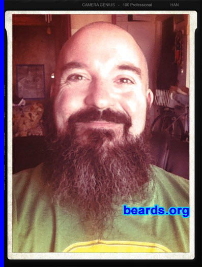 Travis E.
Bearded since: 2011. I am a dedicated, permanent beard grower.

Comments:
I am a long admirer of the look of short cropped top hair, accompanied by a long full beard. I wanted to see how I would look with that style.  So a year ago, I decided to go for it.

How do I feel about my beard? Freaking love it!
Keywords: full_beard