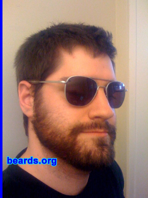 Miguel
Bearded since: 1996.  I am an occasional or seasonal beard grower.

Comments:
My fast-paced lifestyle of video gaming and the occasional trip to the grocery store does not allow time for suitable grooming. The beard started out as a cry for help, a stretch towards introducing myself to society. However, I continue to subject myself to the faceless environment of cyberspace. Who knows how large the beard will grow? I will keep you updated. 

How do I feel about my beard? I am growing to love it; and it is growing to love me.
Keywords: full_beard