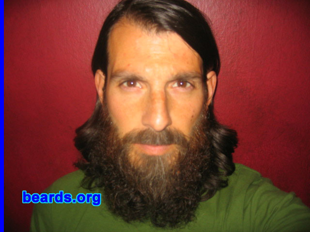Paul K.
Bearded since: 2004.  I am a dedicated, permanent beard grower.

Comments:
I started growing all the hair on my head, including my beard, in September 2007 in an effort to stay warmer during the winter. I had already been maintaining a shorter beard for the last few years, but out of curiosity and a desire to see how long I could grow it, I decided to just let it grow. It's been an interesting and fun journey so far. I cut a couple of inches off in August 2008 to level things up and get a more full and even look to my beard. 

How do I feel about my beard? I like my beard, especially the red that comes in on the sides and the dark thickness from my neck and under my chin. I wish my beard were thicker on my cheeks and on my chin, but I like the small amount of gray that is below my lip and I am curious to see how the color of my beard will change as I get older.
Keywords: full_beard