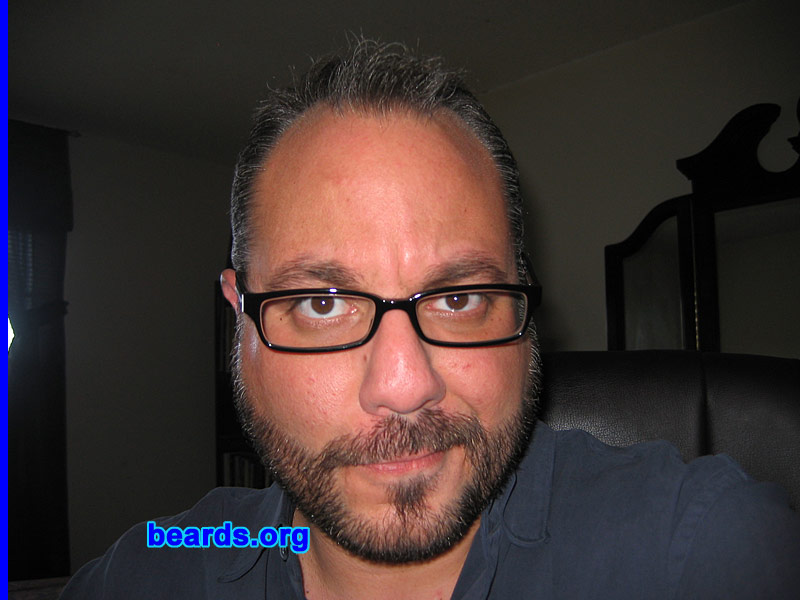 Javier L.
Bearded since: 1989.  I am an occasional or seasonal beard grower.

Comments:
I grew my beard because I was initially inspired by the character of Commander William Riker, portrayed by actor Jonathan Frakes, on "Star Trek: The Next Generation".

How do I feel about my beard? It suits my character. I'm an academic at heart and by trade. So, my beard goes nicely with my glasses and the shelves upon shelves of books I'm constantly surrounded by.
Keywords: full_beard