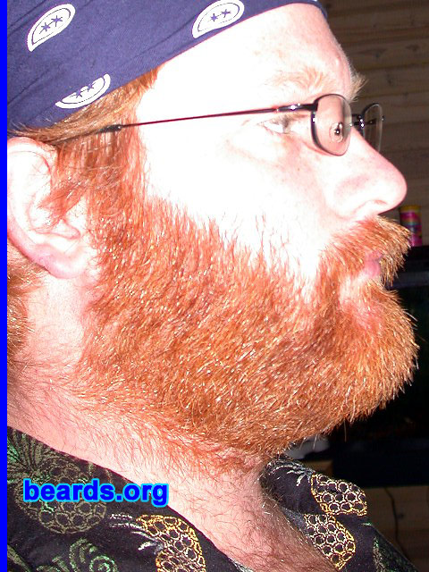 Krist
Bearded since: 2006.  I am a dedicated, permanent beard grower.

Comments:
Well I just started to grow it out for religious reasons as I am a Sikh, I just never strictly followed my religion.  So I said to heck with this business of shaving for employers.  That is slavery and bigotry.  Besides, mankind has beards naturally and your hair is alive and if it was not necessary for it to grow and be there, why do we have it?  Is it for health reasons why we have facial hair?  Some claim a beard is unsanitary.  That is a total lie.  It is a natural air filter and, besides, real men have beards.  Imagine all the bad stuff our beards catch before we breathe it in?  I am growing out all my hair, even on my head now and that is that! In Panjabi, hair is called kesh.

How do I feel about my beard?  Well, I have always been a fan of Santa Claus.  I like it a lot.  I like to look like a big scary viking or mountain man. My wife likes it.  I am part Russian and Russians used to judge a man on his beard.
Keywords: full_beard