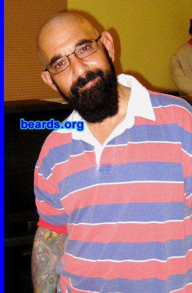 Steve
Bearded since: as long as I can remember.  I am a dedicated, permanent beard grower.

Comments:
In honor of [i]all about beards'[/i] thirteenth year, I decided to go for a new look with my beard. I'm trying to let my goatee grow as long as possible. I was also curious how I would look with a shaved head and a beard. For now, anyway, I'll keep this look. These photos are certainly different from the ones I sent in the past.

How do I feel about my beard?  I WILL NEVER SHAVE IT OFF. It has become part of me over the years.
Keywords: full_beard
