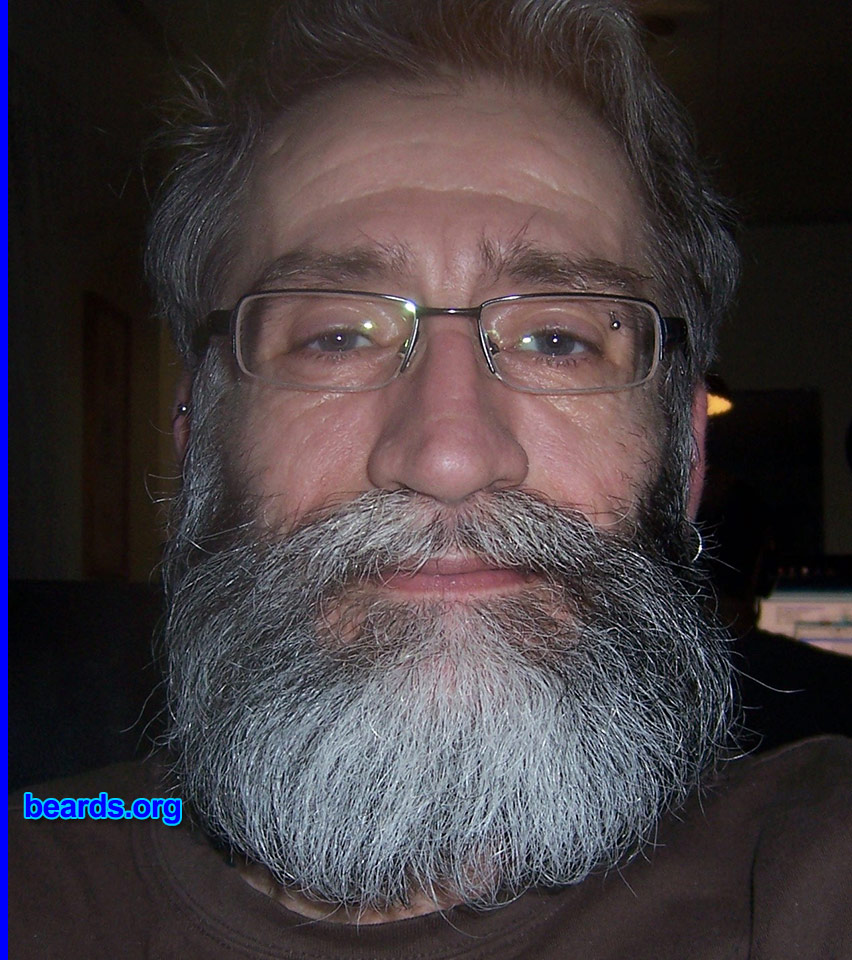 Richard L.
Bearded since: 2003. I am a dedicated, permanent beard grower.

Comments:
Why did I grow my beard? I'd been growing a short, trimmed beard from 2003 until May of 2013 when I had to shave it off because of a visit to my doctor.  He required it.  But since July 2013 I have not shaved or trimmed my beard. It's all gray, pretty much.  But I love my beard and love facial hair.  Always have. I've had a mustache/goatee since the early '90s.  Now that I'm a bit older, it's all beard all the time.

How do I feel about my beard? I absolutely love my beard and would feel naked without it. Makes me feel more manly than I've ever felt in my life. I have to say that the longer it gets, the more respect I seem to get out in the public and more guys acknowledge my presence. Since I'm a smaller guy, 5'8'' and 130 pounds, this certainly helps with my ego and gives me more confidence about self.
Keywords: full_beard