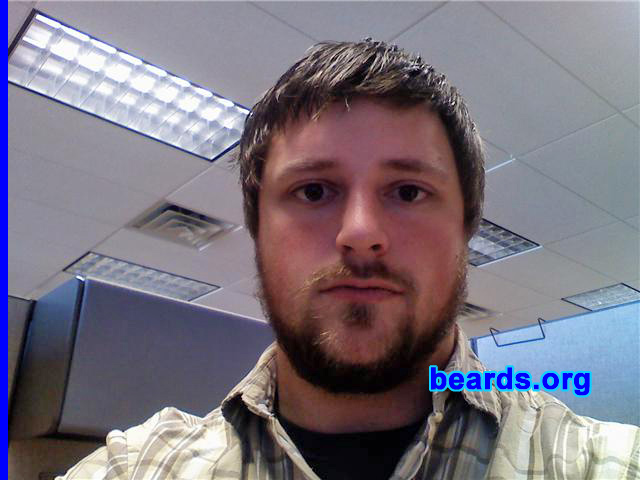 Hoss
Bearded since: 2003.  I am a dedicated, permanent beard grower.

Comments:
I've had a chin strap since when I was right out of high school. I have had a soul patch since I was fourteen. I've kept my beard short and trimmed my whole life, but over the last month or so, I've decided I want to try my hand at growing a full beard. I really have no "reason" to grow it, other than I want to try it and see how it looks.

How do I feel about my beard?   It's coming along slowly but surely. I wish it were thicker, but I suppose that comes with time. I enjoy the novelty of growing it and would very much like to have a huge, glorious, manly beard and one day compete.
Keywords: full_beard