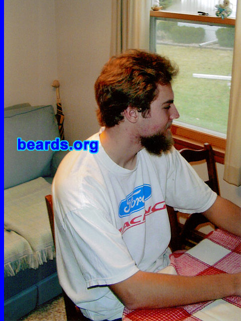 Chris
Bearded since: 2005.  I am an experimental beard grower.

Comments:
I grew my beard because I wanted to see what it would look like when it was long with all the bald spots filled in.

How do I feel about my beard?  I wish it were thicker, but I love it.  I grew it for six months when I was 17. I would grow it long again, but I am a college student and do internships, so I have to look clean.
Keywords: goatee_mustache