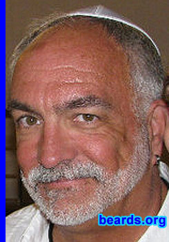 Kevin
Bearded since: 1973. I am a dedicated, permanent beard grower.

Comments:
Why did I grow my beard? Well, it was the '70s.  We were all growing beards. My sideburns were creeping towards each other at a relentless pace and I was just shaving my mustache and the area directly below. I went for it and have never shaved fully since (Halloween excepted).

How do I feel about my beard? It has defined who I am for twice as long as my bare face before I grew it. I will never shave.
Keywords: full_beard