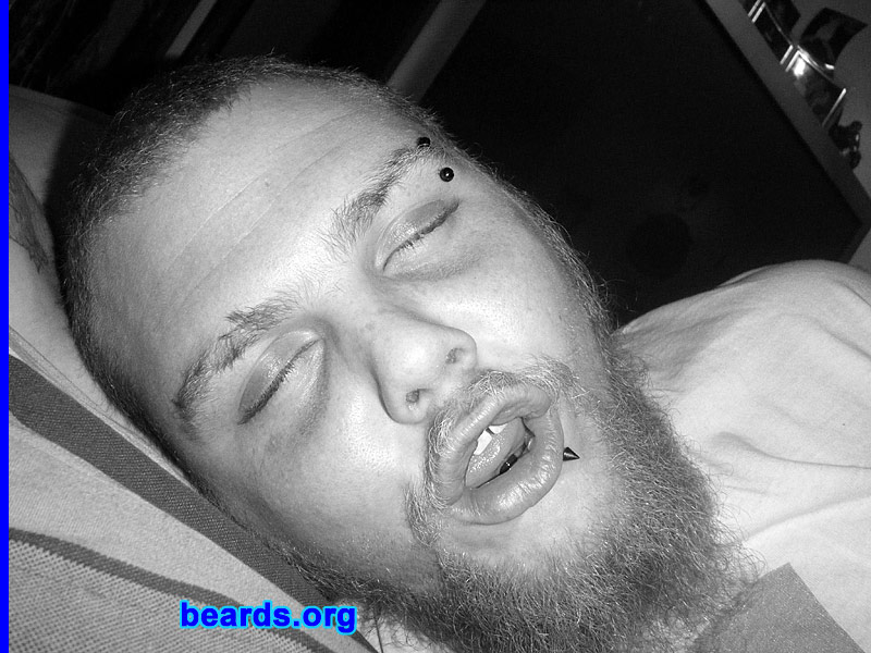 Nate
Bearded since: 2006.  I am a dedicated, permanent beard grower.

Comments:
Growing up from my teens, I couldn't grow any facial hair. I tried shaving, even when there was nothing to shave. When I turned nineteen and had my daughter, a beard started to grow! I kept it ever since.

How do I feel about my beard? I love my beard.  Sometimes I grow it full and sometimes I keep the long goatee. The only issue I have is that no matter how long I go without trimming, it doesn't seem to get any longer.
Keywords: full_beard