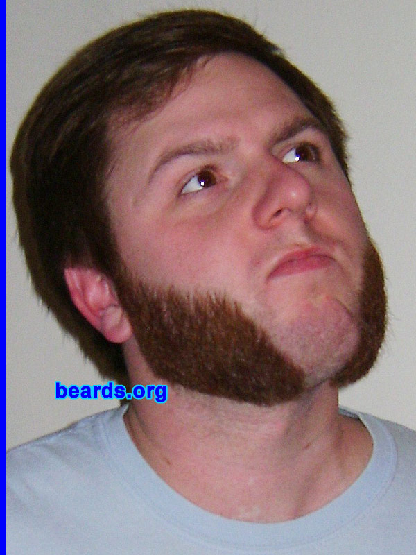 Brian H.
Bearded since: 2006. I am an occasional or seasonal beard grower.

Comments:
It started out as a beard void of a mustache. I let it grow for about two months until it was a little under two inches long and then I cut it into some intense mutton chops. There was a blizzard in Missouri, so I figured hardcore weather deserved some hardcore manly facial hair. Since then I have trimmed it multiple times into the much shorter and much less intense length it is now.

How do I feel about my beard? I would feel lost without it. Naked without it. People comment on it constantly. I can't walk through a bar without having someone want to take a picture with me. I get some strange looks every once in a while, but it is worth it.
Keywords: mutton_chops