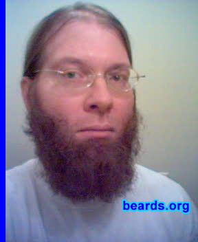 Chris Leavy
Bearded since: 1976.  I am an experimental beard grower.

Comments:
Why did I grow my beard? I'm not sure. It seemed like the thing to do. I'd always admired beards and wanted one, but I'm so ADD (attention deficit disorder) that I have a hard time keeping any one style for very long. Currently, I'm 10 months into a year-beard experiment, which is the longest I've ever gone without changing my beard.

How do I feel about my beard?  After over 30 years of beardedness, I think it's safe to say I enjoy having a beard. I'm more comfortable with one than without.
Keywords: chin_curtain
