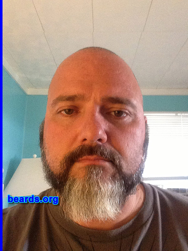 Mike D.
Bearded since: 2004. I am a dedicated, permanent beard grower.

Comments:
Why did I grow my beard? I was a corrections officer for twenty-five years and spent my entire adult life having someone else tell me how I could grow my facial hair. I had a very short beard for the last ten years and when I retired this summer, I started growing it out.

How do I feel about my beard? Love it and will keep growing it until it is about a foot from my chin.
Keywords: full_beard