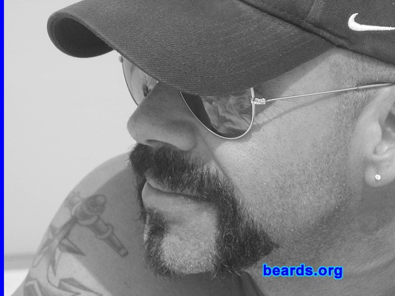 Huck N.
Bearded since:  2002.  I am a dedicated, permanent beard grower.

Comments:
I grew my beard for status.

How do I feel about my beard?  He has a personality all his own.
Keywords: goatee_mustache