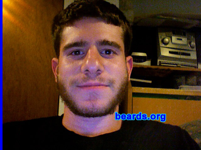 Lawrence
Bearded since: 2010.  I am an experimental beard grower.

Comments:
I am twenty-two. I tried going without shaving for several days at at time during my very early twenties and did not like the appearance of the facial hair.  It looked patchy. This time, however, I really made the commitment and it seems to be improving. This is after six weeks of growth and having it trimmed close by the barber three weeks ago. I am just giving it a try since this is my first beard.

How do I feel about my beard? It's really starting to grow on me, literally and figuratively. It seems to really define my laid-back nature.
Keywords: full_beard