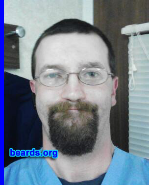 Kyle B.
Bearded since: 1996. I am a dedicated, permanent beard grower.

Comments:
Why did I grow my beard? I first grew it in college just to be different than everyone else in my circle of friends.

How do I feel about my beard?  I love it. I wash it with shampoo several times a week and I daily comb it out. I can't imagine life without it. Naked faces are just not for me. I have had jobs where I was forced to shave it down to just the mustache and I just never felt right. I almost felt naked without it. I will never go without it. I love it (and my wife loves it a lot, too).
Keywords: goatee_mustache