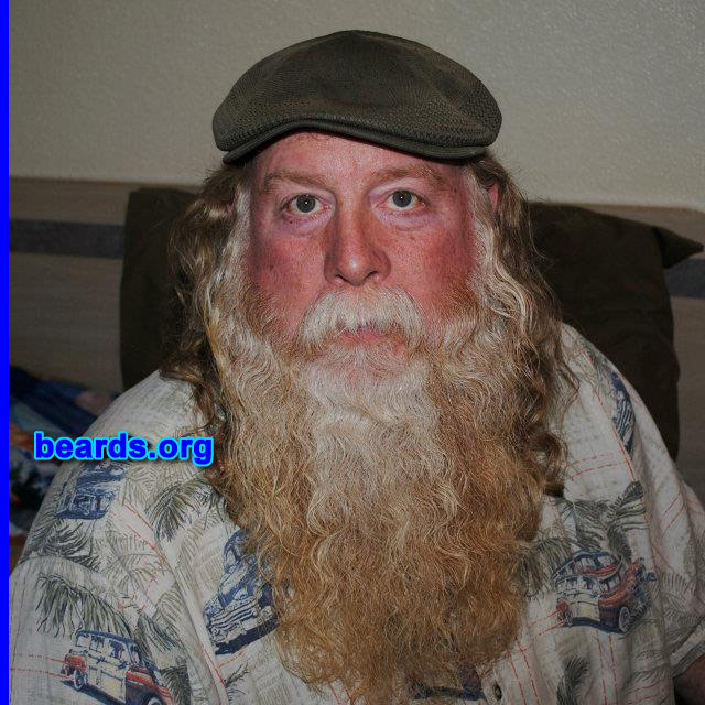 Loren W.
Bearded since: 1971. I am a dedicated, permanent beard grower.

Comments:
Why did I grow my beard? I am a redhead with sensitive skin and shaving irritates it. Over the years I've kept it trimmed, but six years ago I started playing Santa Claus and I haven't cut it since.

How do I feel about my beard? I love my beard. I get lots of comments on it and I love being Santa Claus every year. My once-red hair is now white with some red highlights.  So it fits perfectly for Santa.
Keywords: full_beard
