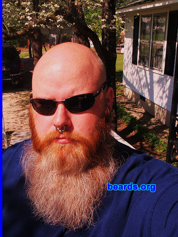 Chris N.
Bearded since: 1993. I am a dedicated, permanent beard grower.

Comments:
I've had a beard of some sort since I was seventeen years old. My current beard, I've been growing for about nine months. I've wanted to grow it out for years but would always have a trim mishap or just grow tired of the middle-phase look. I had a good start twice now on a full beard, but welding accidents have taken them both times....cutting torches and beards do not mix, by the way. After fixing said problems, the beard that I have now is great.

How do I feel about my beard? I love my beard and get lots of reactions from people, both good and bad. I plan on growing my beard 'til it just wont grow anymore.
Keywords: full_beard