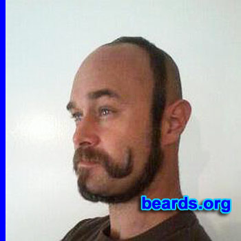Joseph
Bearded since: 1994 on and off. I am an occasional or seasonal beard grower.

Comments:
Why did I grow my beard?  Because I can. I call this one The Vertical Halo Handle Bar.

How do I feel about my beard? Love it! Nice and thick!!
Keywords: creative