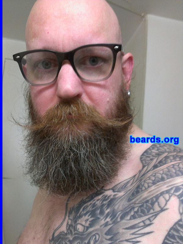 Justin A.
Bearded since: 1997. I am a dedicated, permanent beard grower.

Comments:
I grew my beard because I've always admired them and I've wanted to grow one from a young age.

How do I feel about my beard? I wish it were thicker and either more red or pure white. It's more wild than I'd like. I wish it grew more straight, or, conversely, I think it would also be better if it grew in tight curls.
Keywords: full_beard