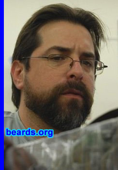 Rolando R.
Bearded since: 1991.  I am a dedicated, permanent beard grower.

Comments:
I grew my beard to look older and wiser... plus I hate draggin' a blade across my face.

How do I feel about my beard? I love my beard. I've had it longer than any pet I've ever owned. It's even been hit by a car once... and lived!
Keywords: full_beard
