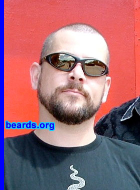 Scott
Bearded since: 2004.  I am a dedicated, permanent beard grower.

Comments:
I had a shaved head and a goatee for over ten years and, essentially, I became tired of shaving.  Never having grown a full beard before, I simply decided to let it grow to see how it looked.

I love it; I wish I had grown a full beard years ago! I recently had to shave it down to the goatee again for the recent run of The Rocky Horror Show at the Zachary Scott Theatre Center here in Austin, TX.  As soon as the six-week run ended, I stopped shaving and my beard is coming back in nicely.
Keywords: full_beard