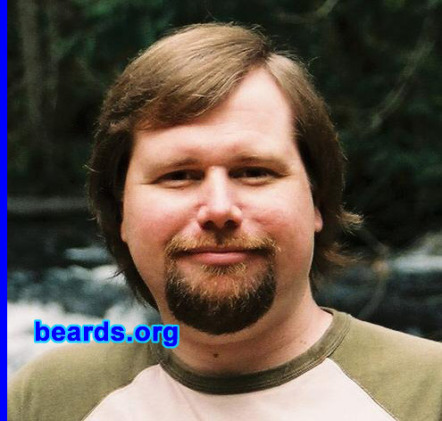 Mike D.
Bearded since: 2004.  I am a dedicated, permanent beard grower.

Comments:
I started growing my beard at a very hard and sad time in my life. After a number of months, I felt more like the real me with the beard than without it.  I have had a full beard on and off for a few years. But I feel I want to grow out my beard for good and leave it alone for many years.  People these days think a man is not clean with a beard...but most people come off as fools these days, so who cares?

How do I feel about my beard?  I feel good with it. I feel real and a far more natural man.  I like the way my face looks with it than without it.  I will never be without some form of a beard.  I have had to change my job as a security officer.  But I did not like being that clean cut, so it works out I get to be me.
Keywords: goatee_mustache
