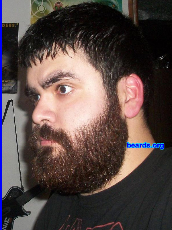 Sergio R.
Bearded since: 2011. I am an occasional or seasonal beard grower.

Comments:
I could grow a beard at age sixteen, being a freshman in high school. I guess I never really grew it because I was self conscious of how I looked before it was thick and full. Funny story though, I finally decided to fully grow it out to try and impress a girl that was into beards. Well nothing ever happened, but doing that made me fall in love with having a full beard. After realizing I am capable of growing a full beard, I simply had to.


How do I feel about my beard? I feel much more mature. My beard helps define who I am. When I look at myself clean shaven I think, "man, I look so normal". Having black hair, I love how my beard turns to a shade of dark brown, with few random red and blonde hairs here and there. I regret not growing it out earlier in my life. But now that I have, it's definitely staying...the thicker, the better. Every day it just gets better and better. 
I love how even and thick it is. It lets me express who i truly am.

I love it.  I feel naked without it. I never liked how it looked at two weeks into it, before it was thick and full.  But now that I've gone through with it, I really enjoy having it.
Keywords: full_beard
