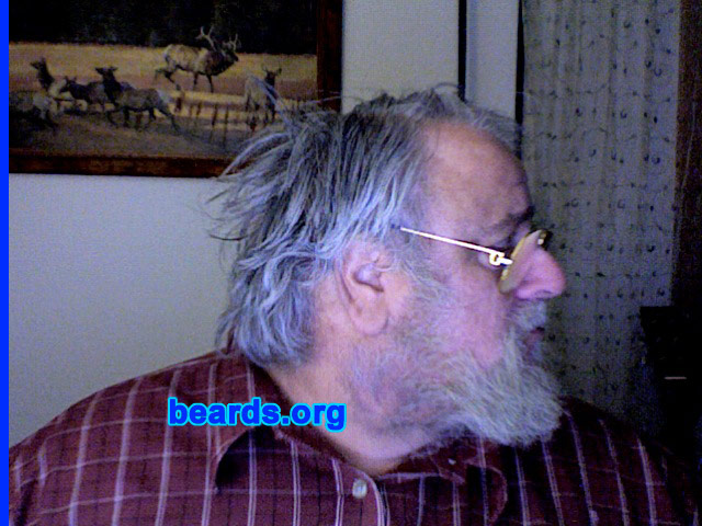 William P.
Bearded since: 2009.  I am an experimental beard grower.

Comments:
I grew my beard because of a burned lip, chin, and almost eyes with hot coconut oil splattered while sitting in front of a skillet.

How do I feel about my beard? I think that even in West Virginia near the Pennsylvania line it is going to be hot. Father said to grow one in winter, shave it in summer.
Keywords: full_beard