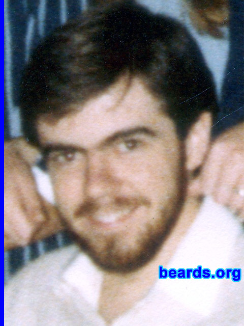 Phil Harvey
Bearded since: 1983.  I am an occasional or seasonal beard grower.
Pictured here: age eighteen with my first beard.

Comments:
I grew my beard for many reasons, such as it keeps my face warm in winter and I think I look better with it.

I love the feel of it.
Keywords: full_beard