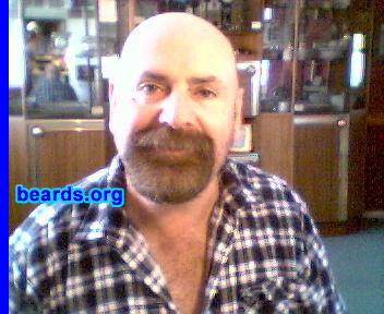 Gary
Bearded since: 2000.  I am an experimental beard grower.

Comments:
As I am getting older, I have put some weight on and because of this, my jaw line has slowly disappeared and having a beard disguises the fact.  Also, I have been told that i grow a great beard.

How do I feel about my beard?  I don't mind having a beard.  The only down side would be the constant maintenance required, but it's a whole lot better than having to shave daily.
Keywords: goatee_mustache