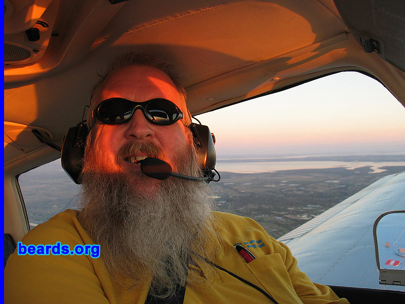 Mick
Bearded since: 1975. I am a dedicated, permanent beard grower.

Comments:
I liked the "rebel" look a beard projected back in the '60s and '70s.  So as soon as I could do so, I started on mine. In the years since, I've varied it from "designer stubble" through to full-on ZZ Top in style and length. Settled on the current style about fifteen years ago.

How do I feel about my beard? It is a part of me now. I could no more remove it than I could remove my arm.
Keywords: full_beard