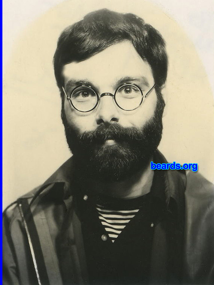 Michael
1974 -- Round glasses: I was twenty-three years old in this picture. It was a rainy day and the water just rolled off my beard. What a wonderful sensation.

[b]Go to [url=http://www.beards.org/beard03.php]Michael's beard feature[/url][/b].
Keywords: full_beard