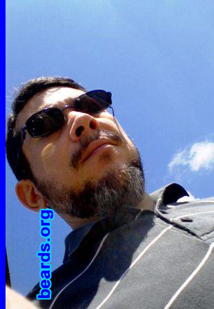 Luis G.
Bearded since: 2012. I am an experimental beard grower.

Comments:
I decided to let my beard grow because I think it is beautiful, grizzled as it is.

How do I feel about my beard? I feel comfortable. Just want to let it grow.
Keywords: full_beard