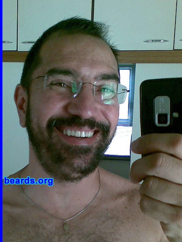 Silvio
Bearded since: 2008.  I am an experimental beard grower.

Comments:
I grew my beard because I was tired of the baby look that clean shaven men inevitably have. Just love the professorial look that a beard can confer to some men!

How do I feel about my beard?  Genetics could have been nicer to me... would love to have a lumberjack type of beard.
Keywords: full_beard